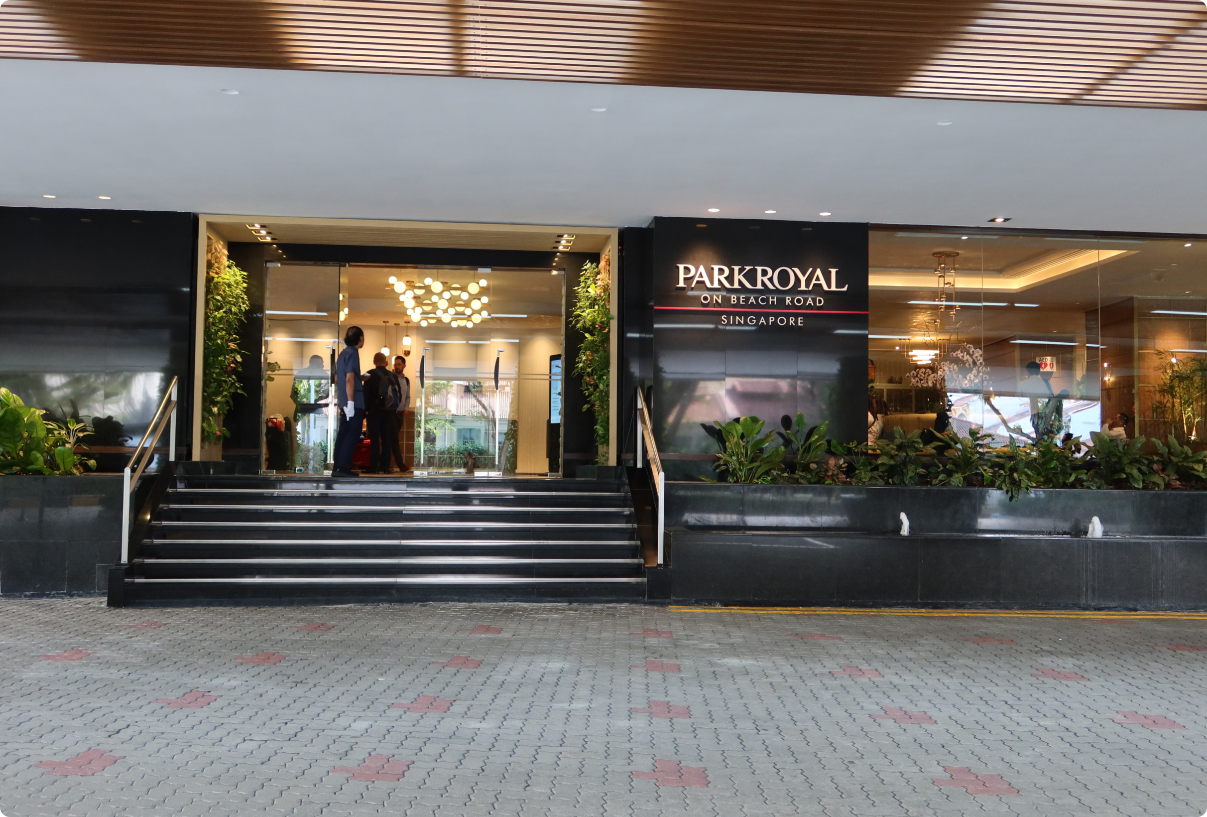 Enter the hotel lobby and turn right towards Si Chuan Dou Hua restaurant.