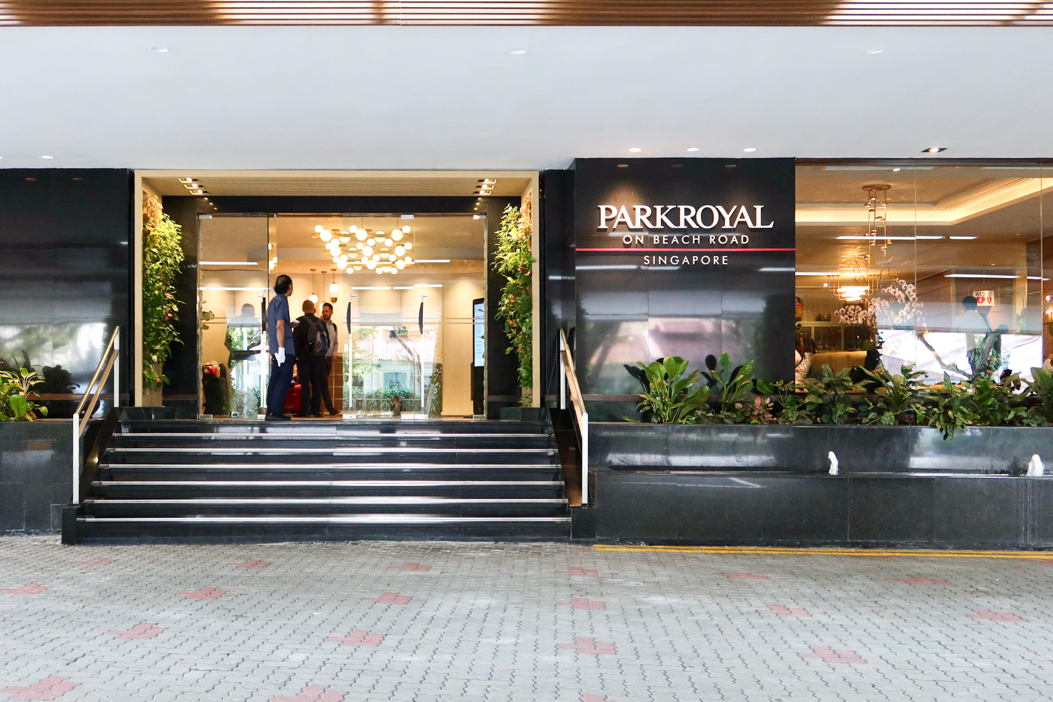 Enter the hotel lobby and turn right towards Si Chuan Dou Hua restaurant.